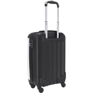 A black wheeled bag with a retractable handle and four wheels, featuring a sleek, textured design and a logo.
