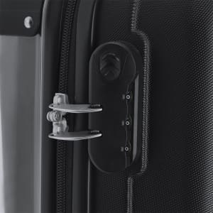A close-up of a black wheeled bag's locking mechanism and zipper, featuring a small branding logo.