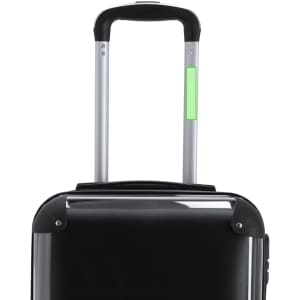 A black wheeled bag with a silver extendable handle and a green accent on the handle. It features a logo.