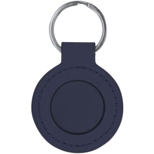 A navy blue keyring with a circular design and a metal attachment loop, featuring a smooth leather-like texture.