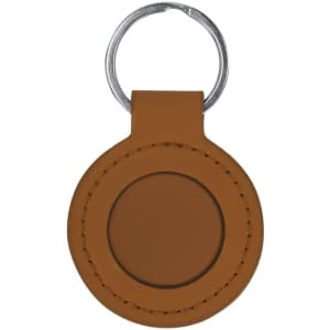 A round, tan leather keyring with a metal loop and stitched edge, featuring a blank central area.