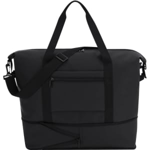 A black extendable bag with dual handles, a shoulder strap, and a front zip pocket. It features a sleek, minimalist design.