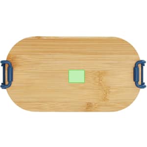 A bamboo lunch box with navy blue handles and a small green square on top.