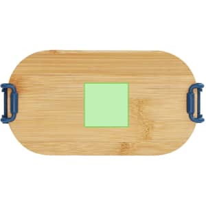 A bamboo lunch box in a natural wood colour with blue handles and a green square feature. It also has a logo.