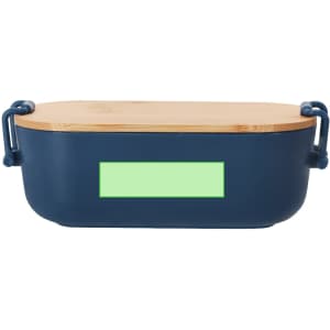 A navy lunch box with a wooden lid and handles, featuring a blank green label area.