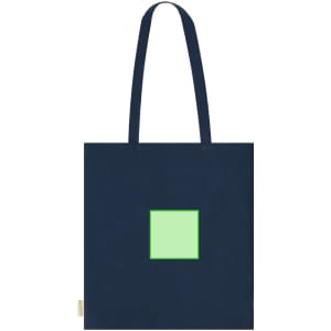 A navy tote bag with a green square design in the centre. The bag features two shoulder straps and has a logo.
