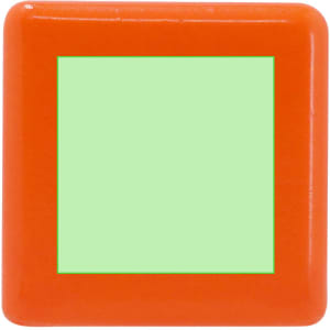 An orange stress-relief square with a green centre, featuring a logo on one side.