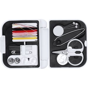 A white sewing kit containing threads, needles, scissors, pins, buttons, and other sewing accessories.