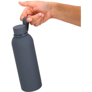 A drink bottle in dark grey, held by a hand, featuring a sleek design and a handle. It has a logo.