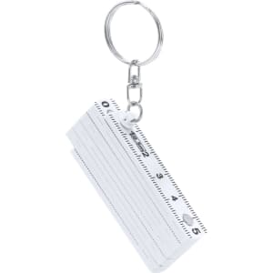 A white keyring ruler featuring measurements up to five inches, attached to a silver keyring.