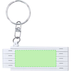 A white keyring ruler with a silver keychain attachment. It features a blank area for customisation.
