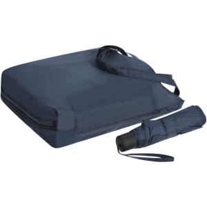 A navy blue umbrella compactly folded beside a matching carry bag with a strap. The bag features a zip closure.