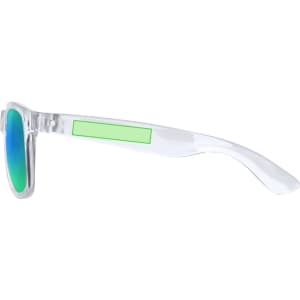 Jarina Sunglasses featuring a clear frame with green accents and blue gradient lenses. Includes a branding logo.