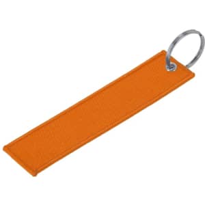 An orange fabric keyring with a metal ring attached for securing keys.