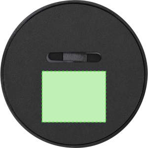 A black circular phone stand with a green accent in the centre and a slot for holding devices.