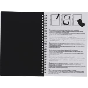 A black, spiral-bound notebook with an erasable surface and a printed instruction page on the right.