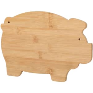 A bamboo cutting board shaped like a pig, featuring a natural wood finish and a simple design.