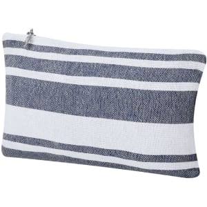 A striped toiletry bag featuring navy and white colours with a zip closure. It has a sleek, simple design.