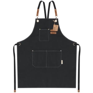 A black apron with multiple pockets and leather straps, featuring a logo and a tag.