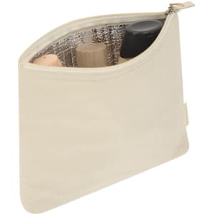 A cream insulated beauty bag with a silver interior, containing various toiletry bottles. It has a logo on the side.