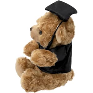 A plush teddy bear in brown fur wearing a black graduation cap and gown, featuring soft, fluffy fur and a friendly expression.