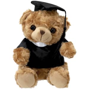 A plush bear dressed in a black graduation gown and cap, featuring a warm brown colour with shiny eyes.