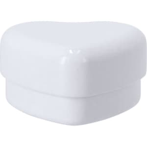 A white heart-shaped candy dispenser with a smooth, glossy finish and a lid. It has a logo on the front.