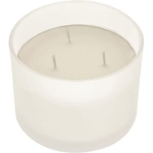 A white, three-wick candle in a clear glass container, designed for home decor and aromatic use.