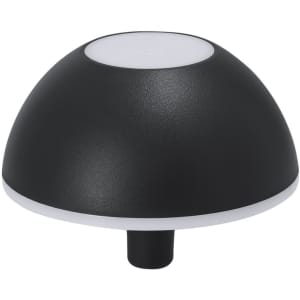 A black lamp with a dome shape and a white base, featuring a simple design and no visible branding.