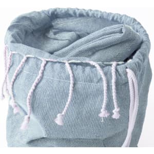 A light blue drawstring bag with a cinched opening, featuring white drawstrings and a simple design.
