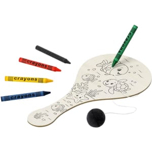 A paddle board with a colouring surface, featuring four crayons in yellow, red, black, and green.