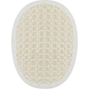 An oval, white exfoliating sponge with a textured surface. It has a smooth edge and a simple design.