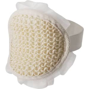 A beige exfoliating sponge with a textured surface and a soft, ruffled edge, featuring an attached strap.