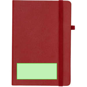 A red notepad with a green placeholder, featuring an elastic band and a bookmark ribbon. It has a logo.