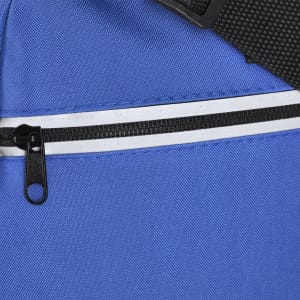 A blue bag featuring a zippered pocket with a white stripe and a black zipper pull. It has a textured surface.