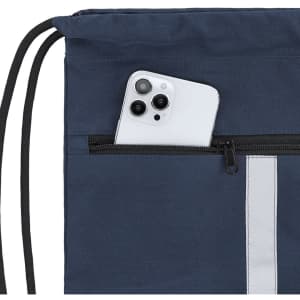 A navy drawstring bag with a white stripe and a smartphone partially visible in a zippered pocket.