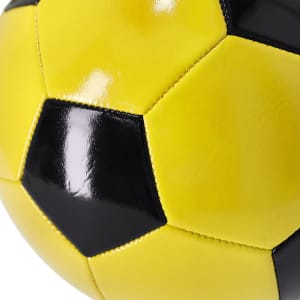 A brightly coloured yellow and black soccer ball with a glossy finish and classic hexagonal pattern.