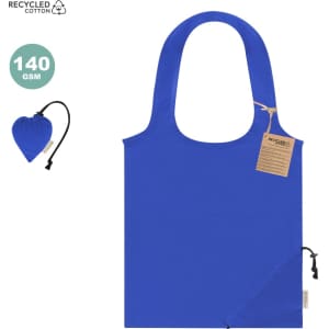 A blue foldable tote bag made from recycled cotton, featuring a branding logo and a compact pouch for storage.