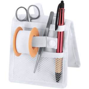 A white nursing organiser containing scissors, tweezers, tape, and pens in various pockets.