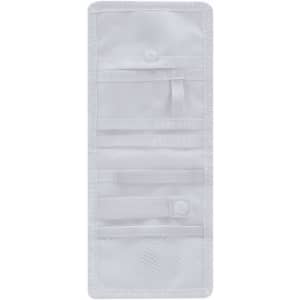 A white nursing organiser with multiple compartments and fasteners for storing various items.