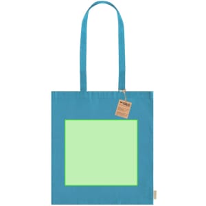 A blue tote bag with a plain green square design, featuring two long handles and a tag.