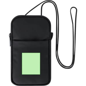 A black multipurpose bag with a green patch and a detachable strap. It features a zip closure and a logo.