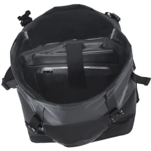 A black Farinor backpack with an open top revealing space for a laptop and compartments inside.