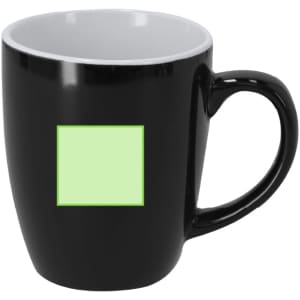 A black coffee mug with a contrasting inner colour and a blank square for custom designs.