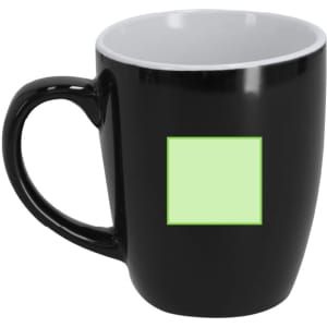 A black coffee mug with a contrasting white interior and an area for customisation. It features a logo or branding.