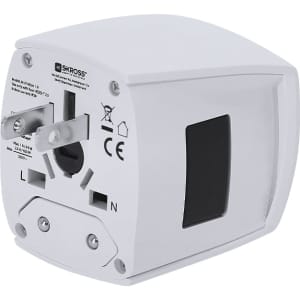 A white universal travel adapter with multiple socket options and a logo on the side.