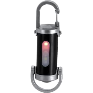 A black and silver Luvaron Torch with a clip attachment, featuring a light and a transparent section.