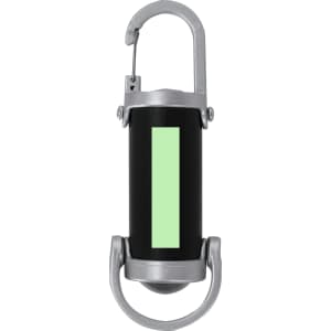 A black Luvaron Torch with a silver carabiner clip and a glowing green stripe. It features a circular bottom for stability.