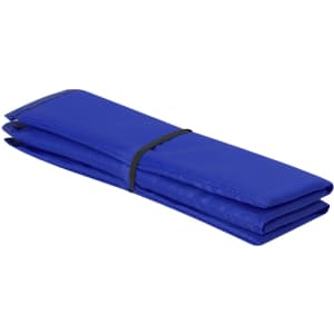 A folded blue cushion secured with a black strap, designed for outdoor leisure use.