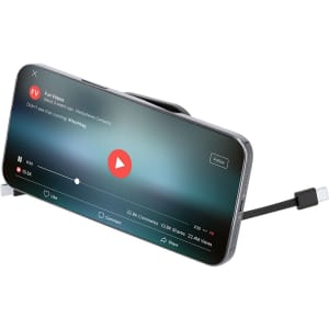 A charging cable in black is connected to a smartphone displaying a video on its screen, with a subtle logo present.